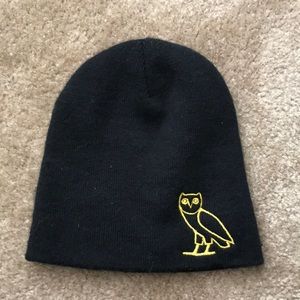 Black beanie. Drake’s brand of OVO emblem.